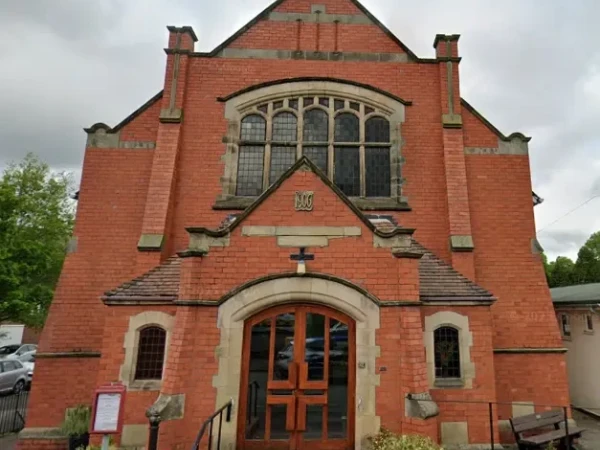 Red-brick church building in Church Stretton, Shropshire, highlighting a local community venue and Voneus Broadband's support for connectivity in the area.