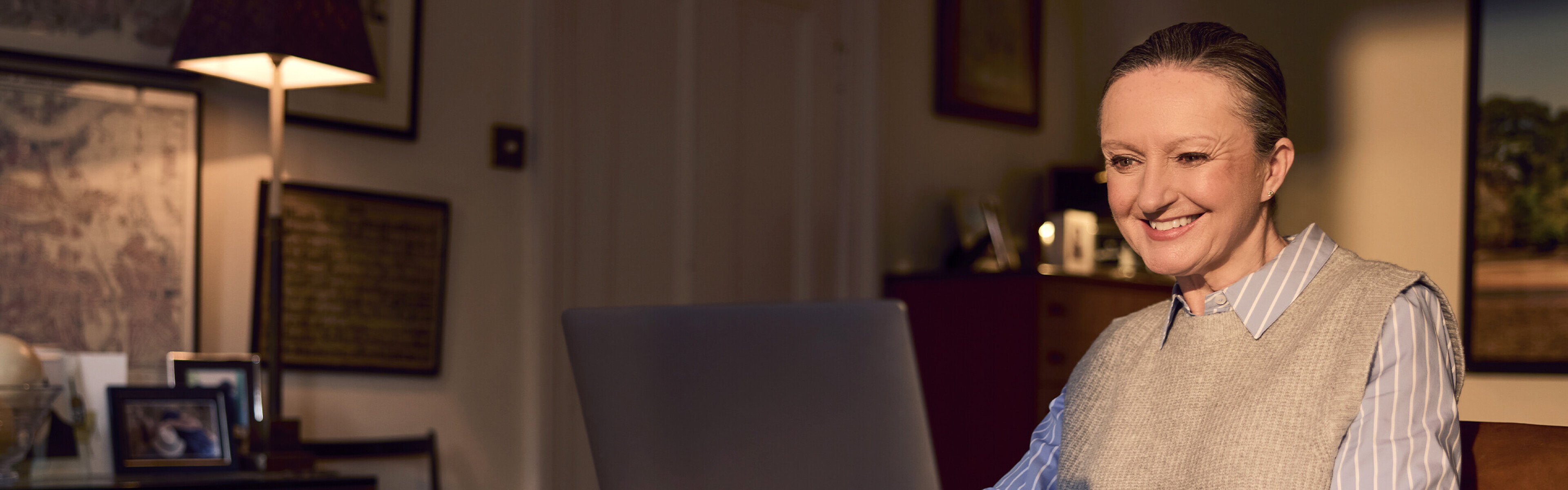 woman working from home smiling