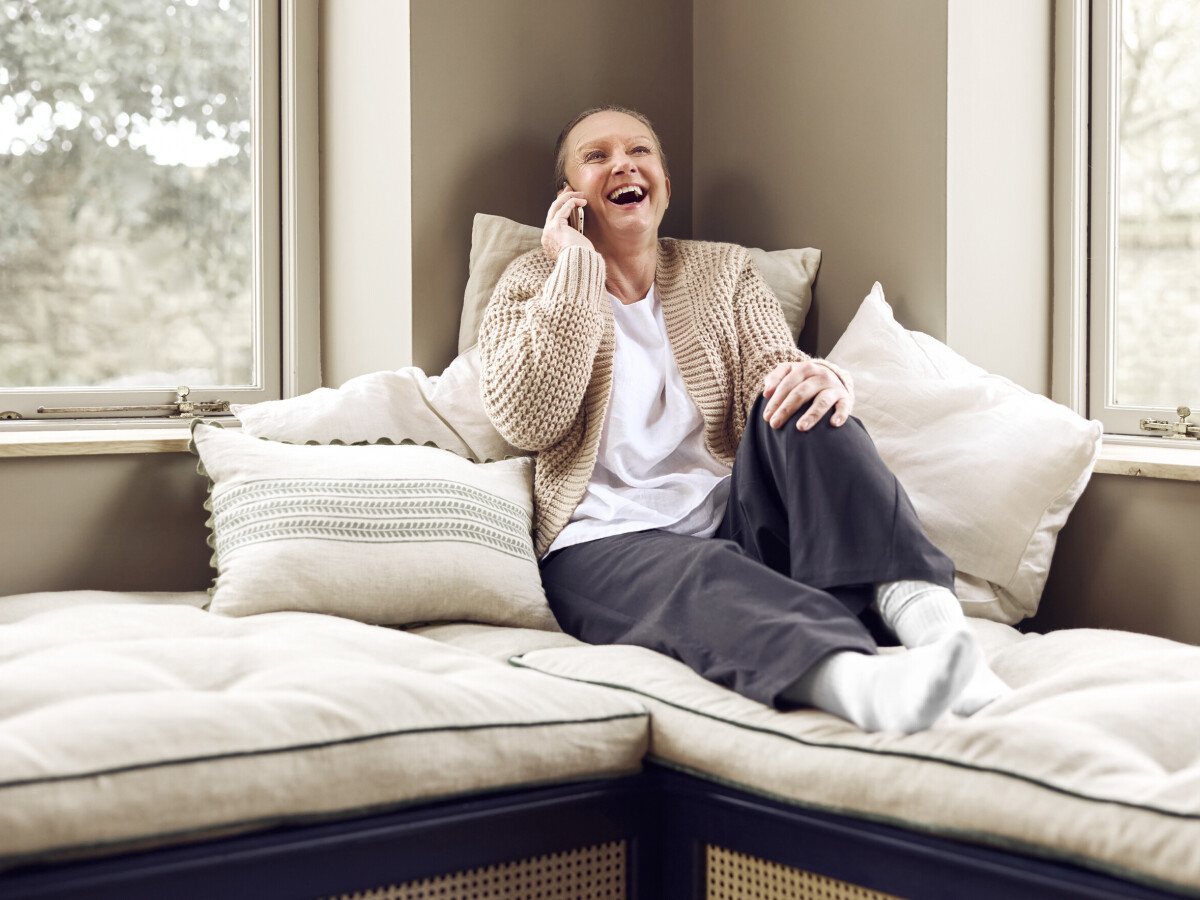 Woman on the phone laughing