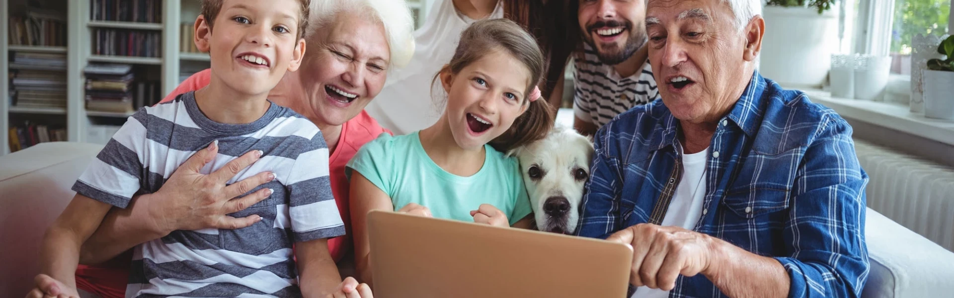 Family using broadband at home while browsing online