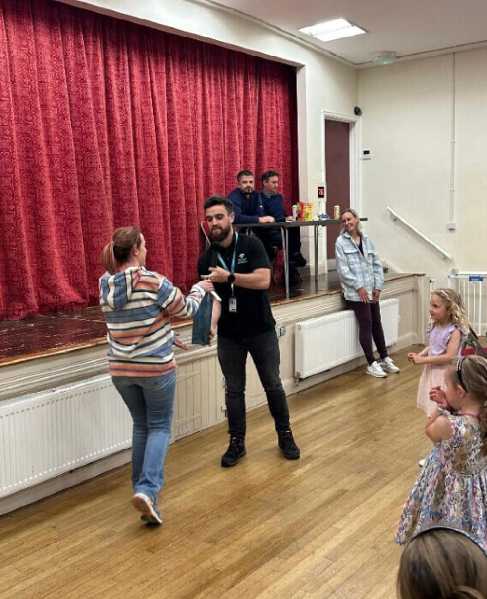 Voneus broadband representative speaking with local residents at a community event, supporting community engagement and broadband awareness across Eden and Penrith.