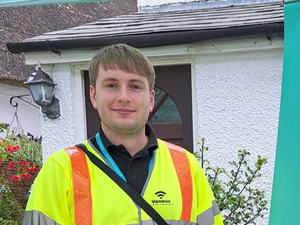 A Voneus broadband representative stood outside a home in Sharlston