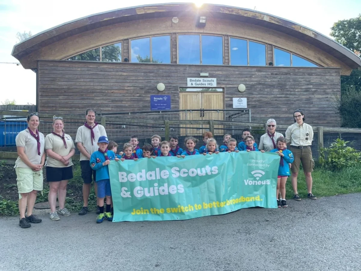 Bedale Scouts and Guides with Voneus Broadband banner in North Yorkshire