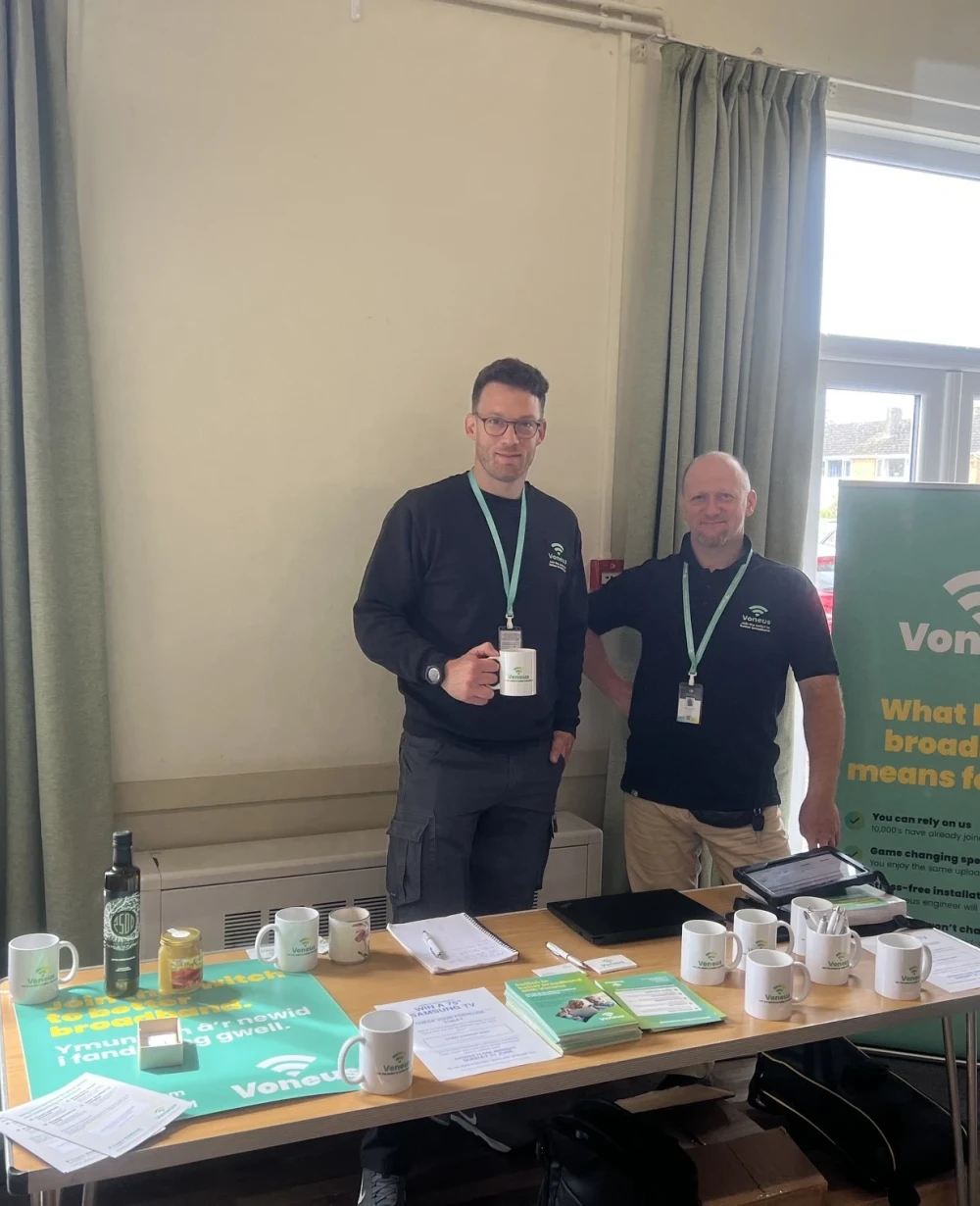 Voneus Broadband team members at a local community event in Usk, helping residents learn about ultrafast broadband availability and packages in the area.