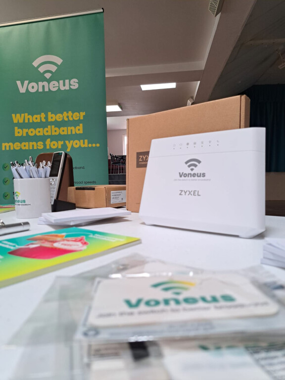Voneus broadband router and information at a local community drop-in event
