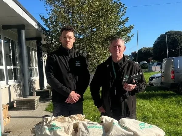 Voneus broadband representatives at an outdoor community information stand, promoting home broadband services to residents in Silloth.